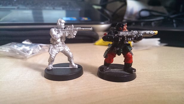 Assembled VAL figure next to Citadel Miniatures Storm Trooper